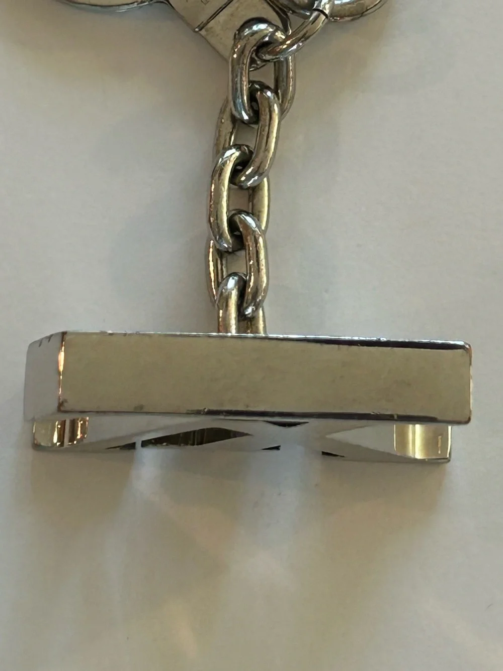 Louis Vuitton Silver Metal LV Logo Keyring Charm